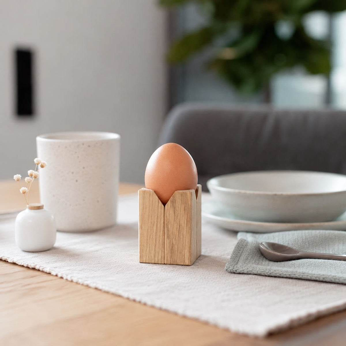 Oak egg cup with breakfast egg