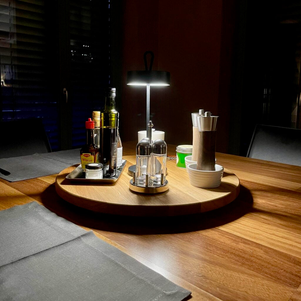 Solid wood serving turntable displayed on a dining table